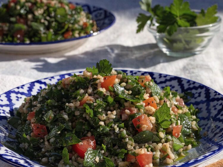 Fresh tabbouleh salad with herbs and tomato